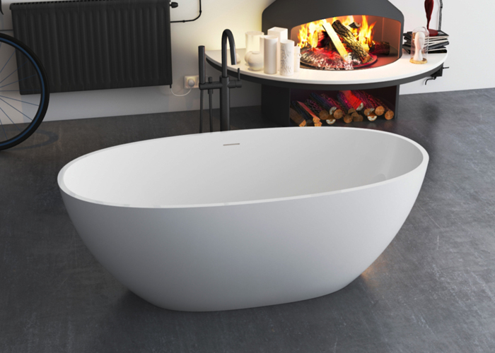 Why hotels tend to use solid surface bathtubs?